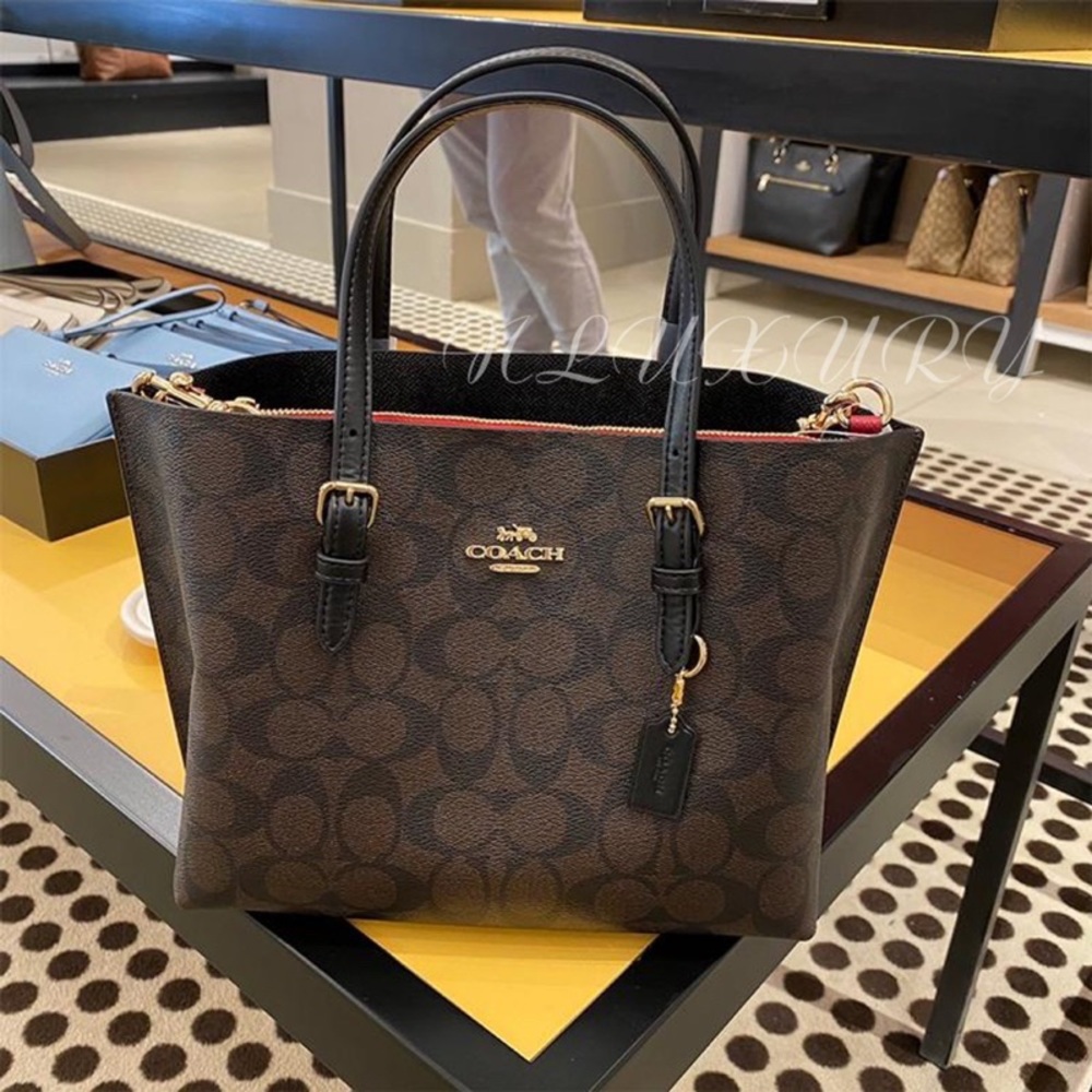 Brand new Coach mini mollie 25